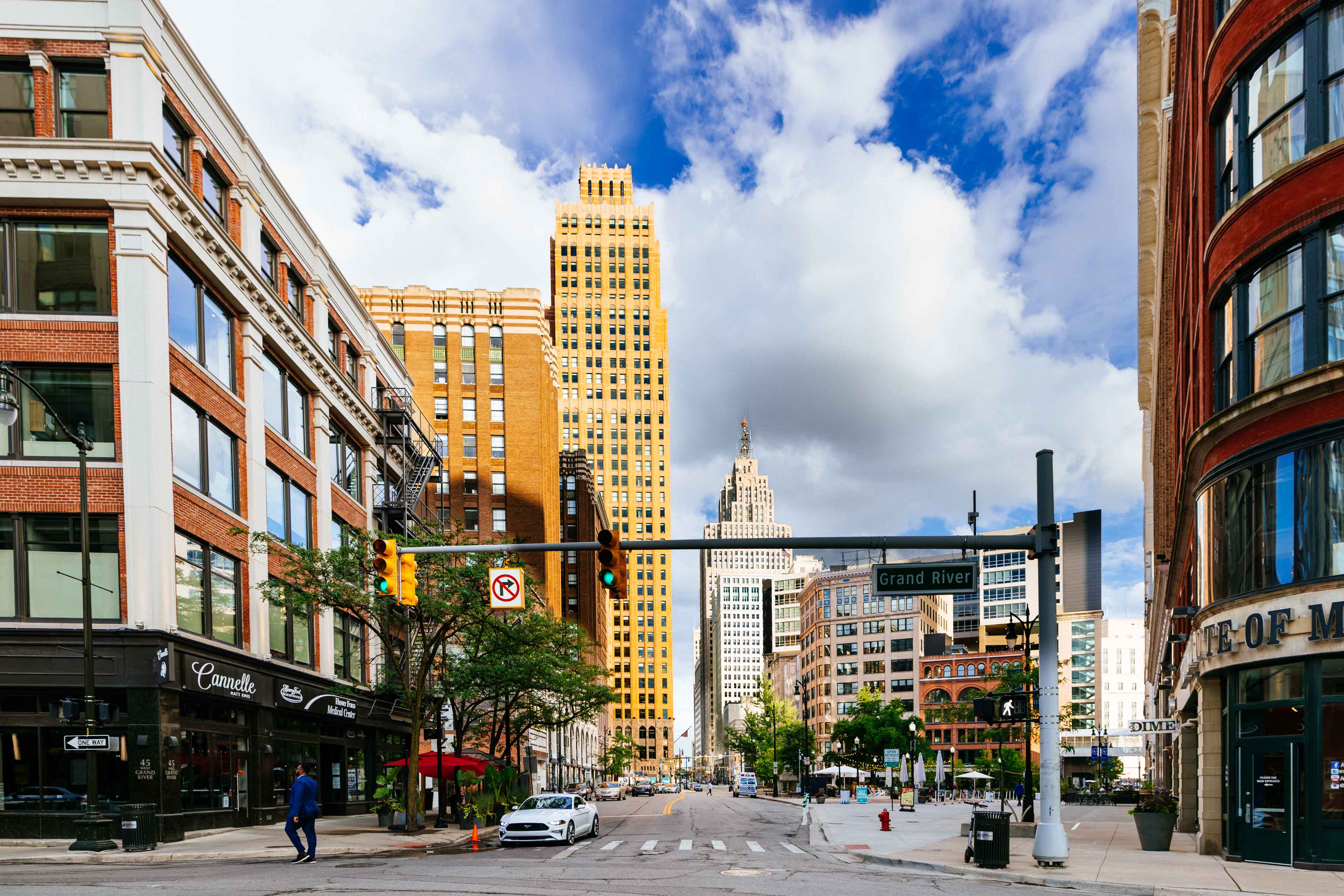 Grand River Avenue at Capitol Park with the David Stott tower