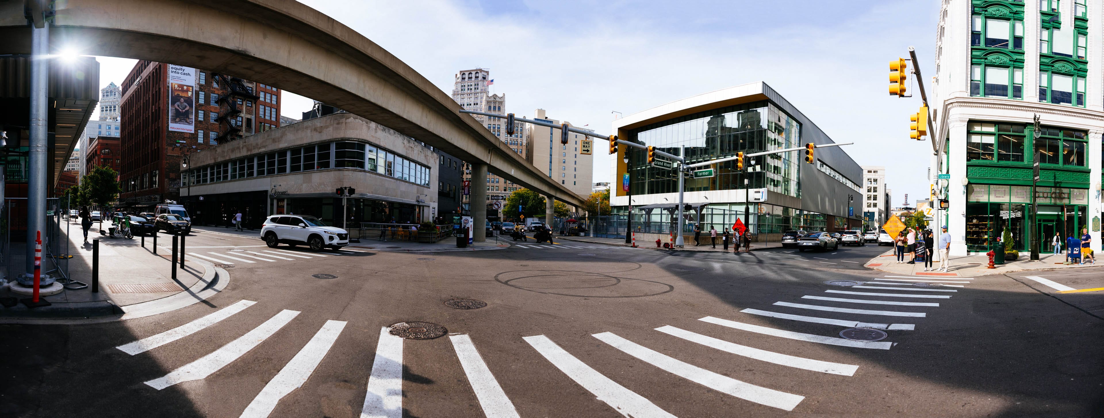 Street-level panorama at Grand River and Farmer beneath the People Mover